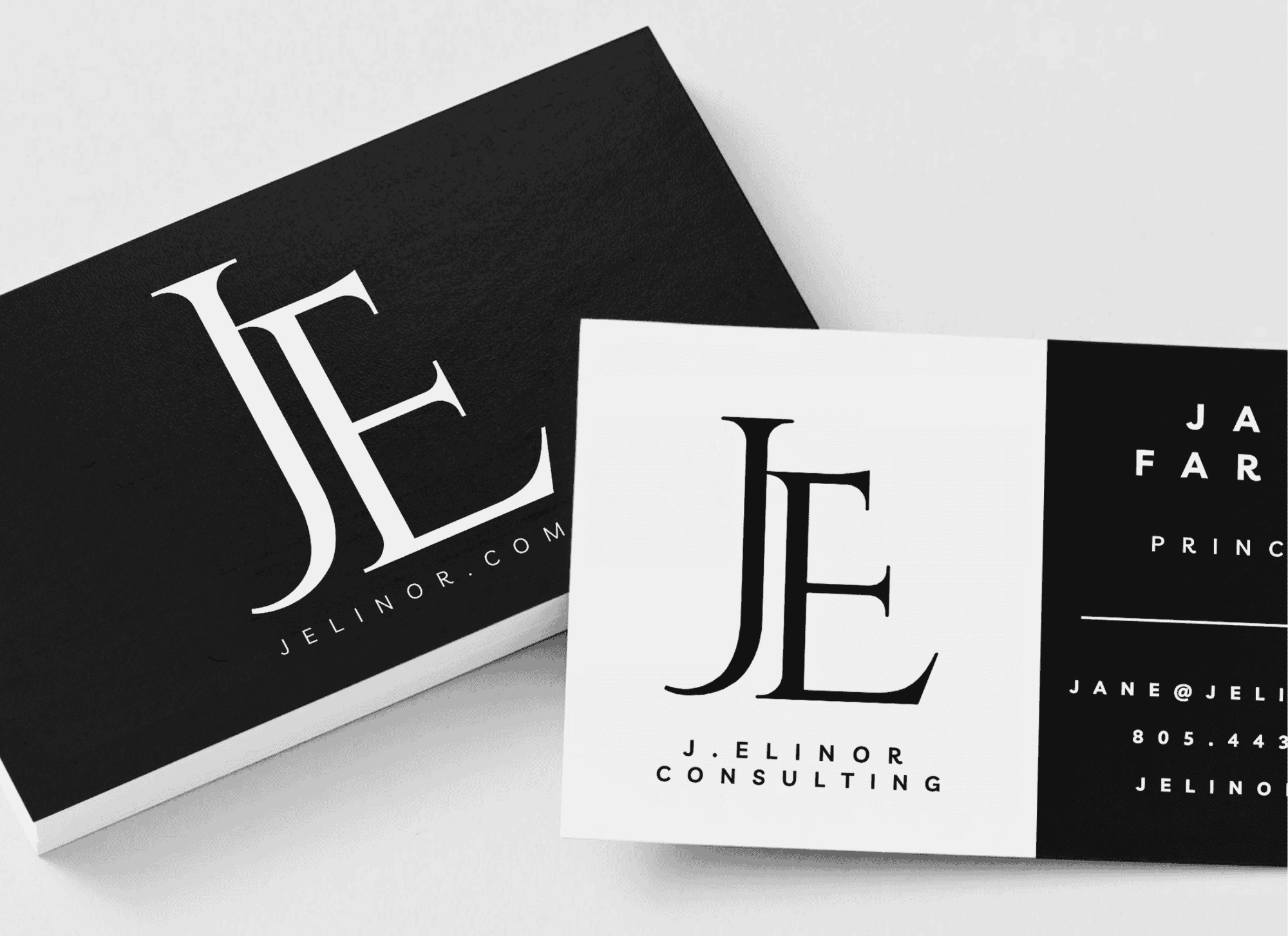 J. Elinor Consulting business cards in black and white