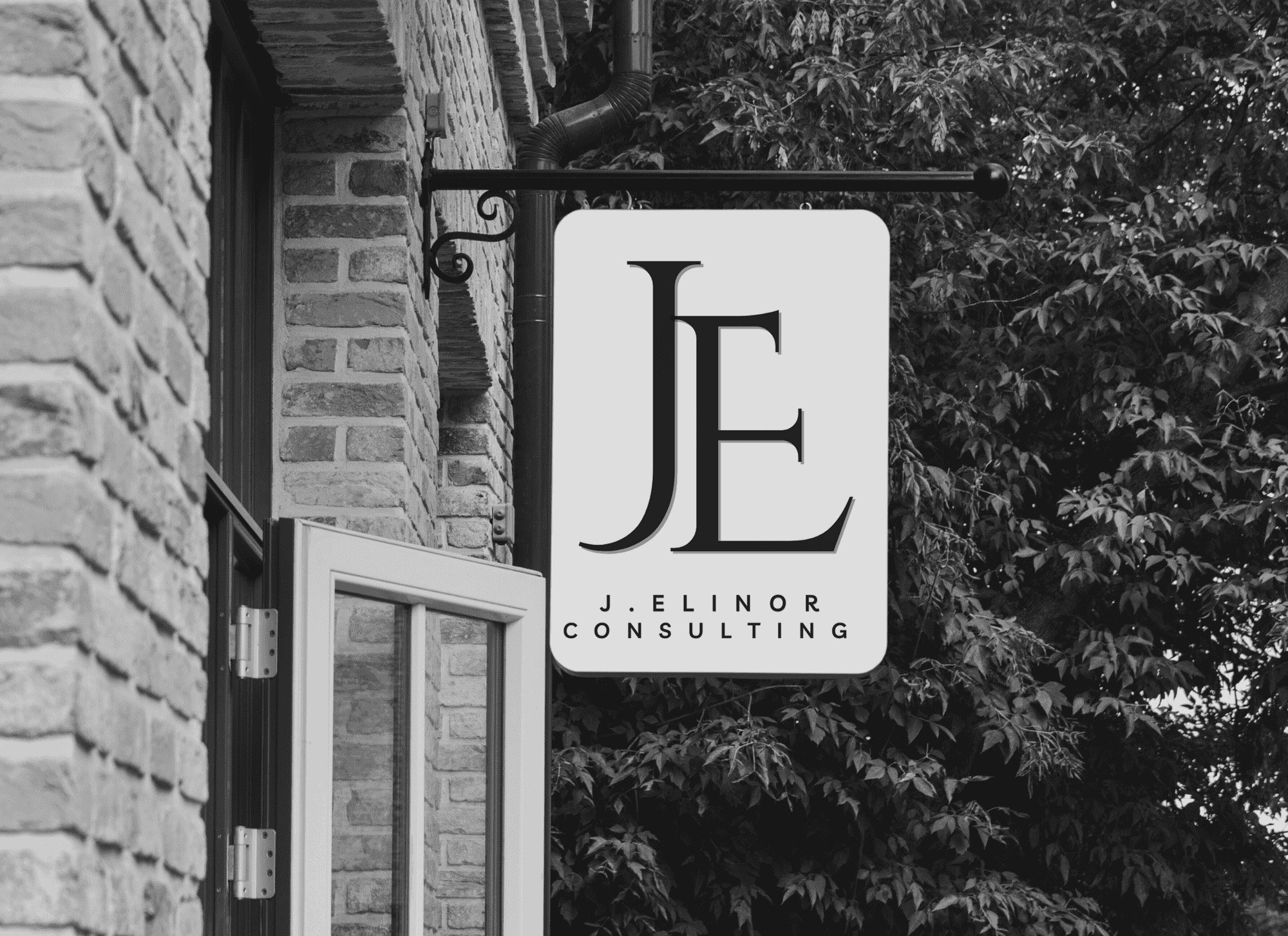 J. Elinor Consulting hanging storefront sign